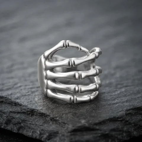 Par de Aretes Clic para Cartílago Mano Calavera
